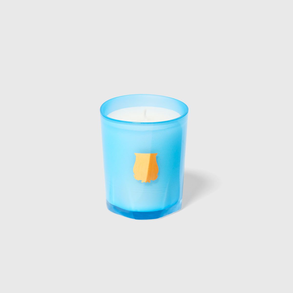 London Beauty Versailles Candle in a light blue frosted glass holder with white wax