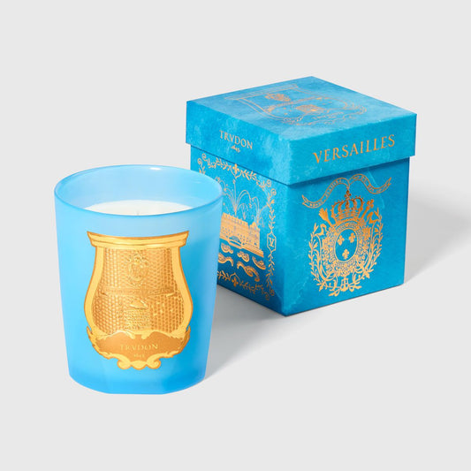 Versailles Candle by London Beauty in blue glass with gold emblem and matching decorative box