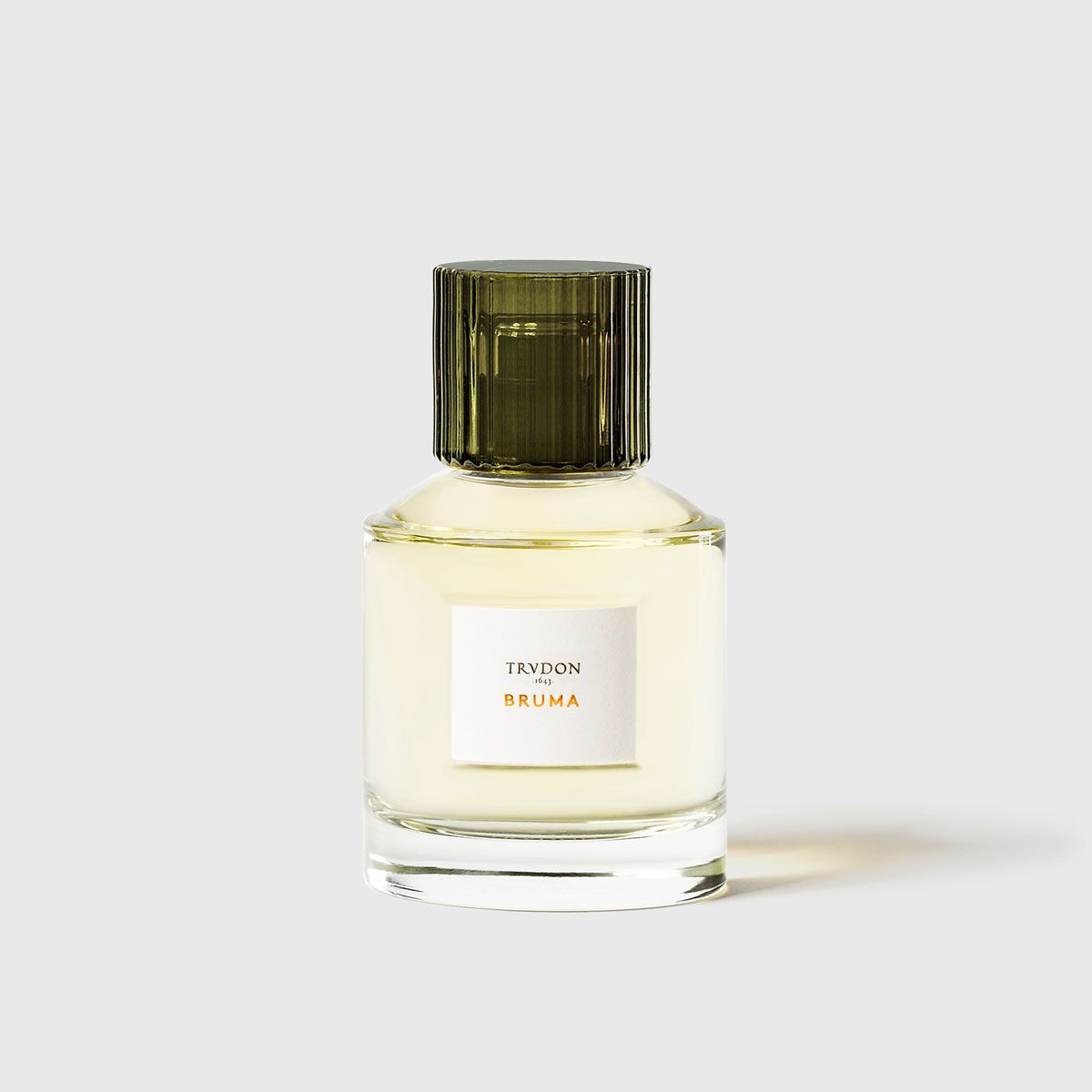 Trudon Bruma Eaux De Parfum in a stylish green-topped bottle for a sophisticated fragrance experience