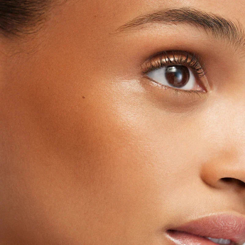 Close-up of radiant skin featuring Westman Atelier Powder Bronzer for a natural glow and warm finish