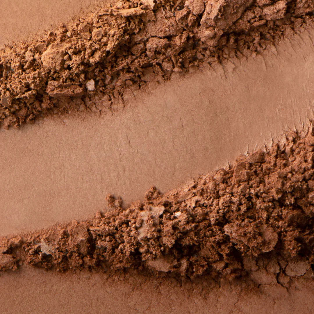 Westman Atelier Powder Bronzer in a Rich, Warm Shade Perfect for Enhancing Natural Glow