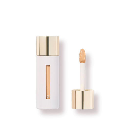 Westman Atelier Skincare Infused Concealer in a sleek white tube with a gold applicator tip