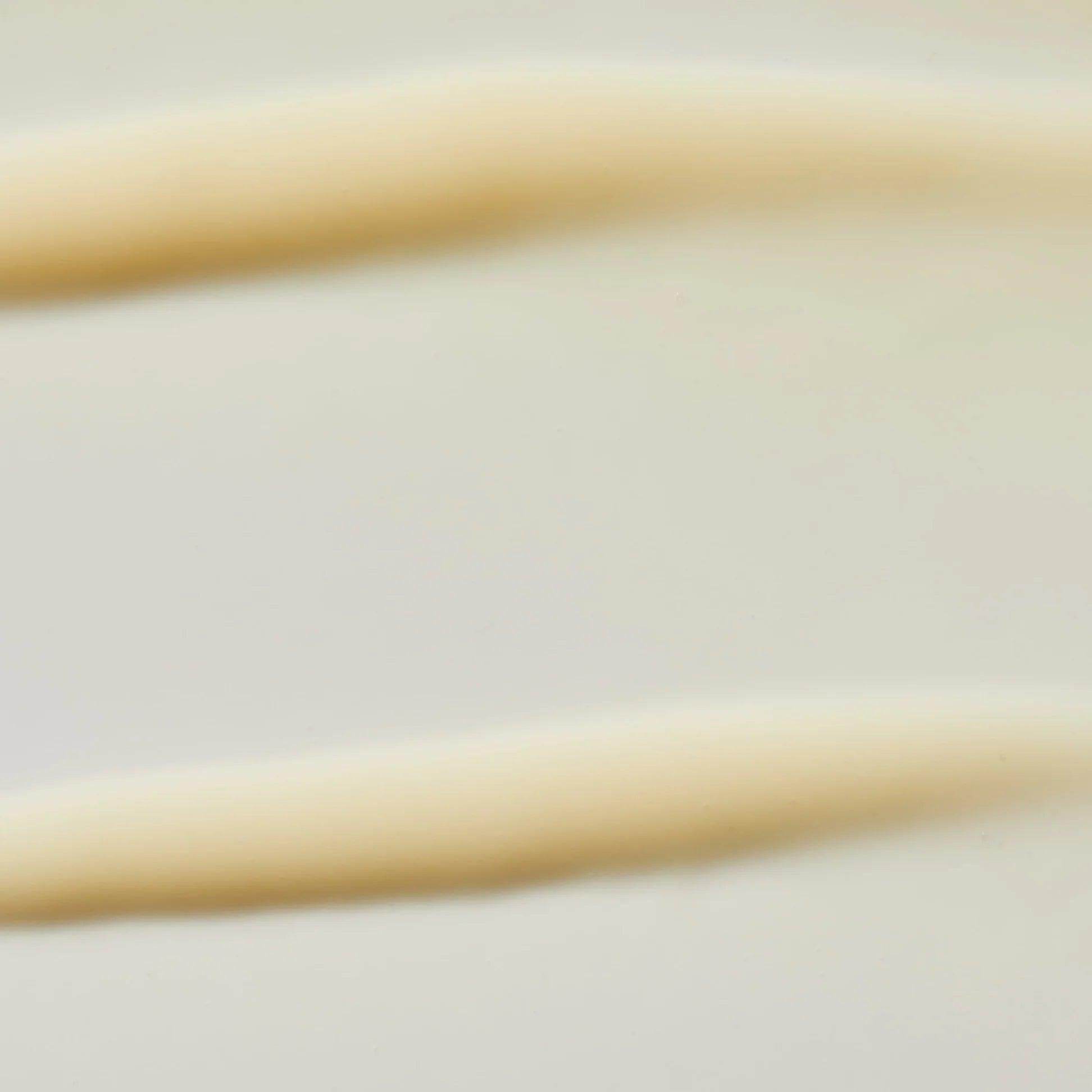 Omorovicza Vitamin C Serum in a sleek bottle designed for brightening and smoothing skin texture