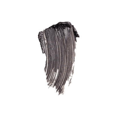 Swatch of Westman Atelier Buildable Mascara showing smooth, dark black formula on a black background