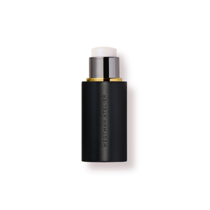 Westman Atelier Highlight Stick in a sleek black container for radiant, glowing skin