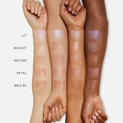 Swatches of Westman Atelier Highlight Stick on diverse skin tones showcasing four colors