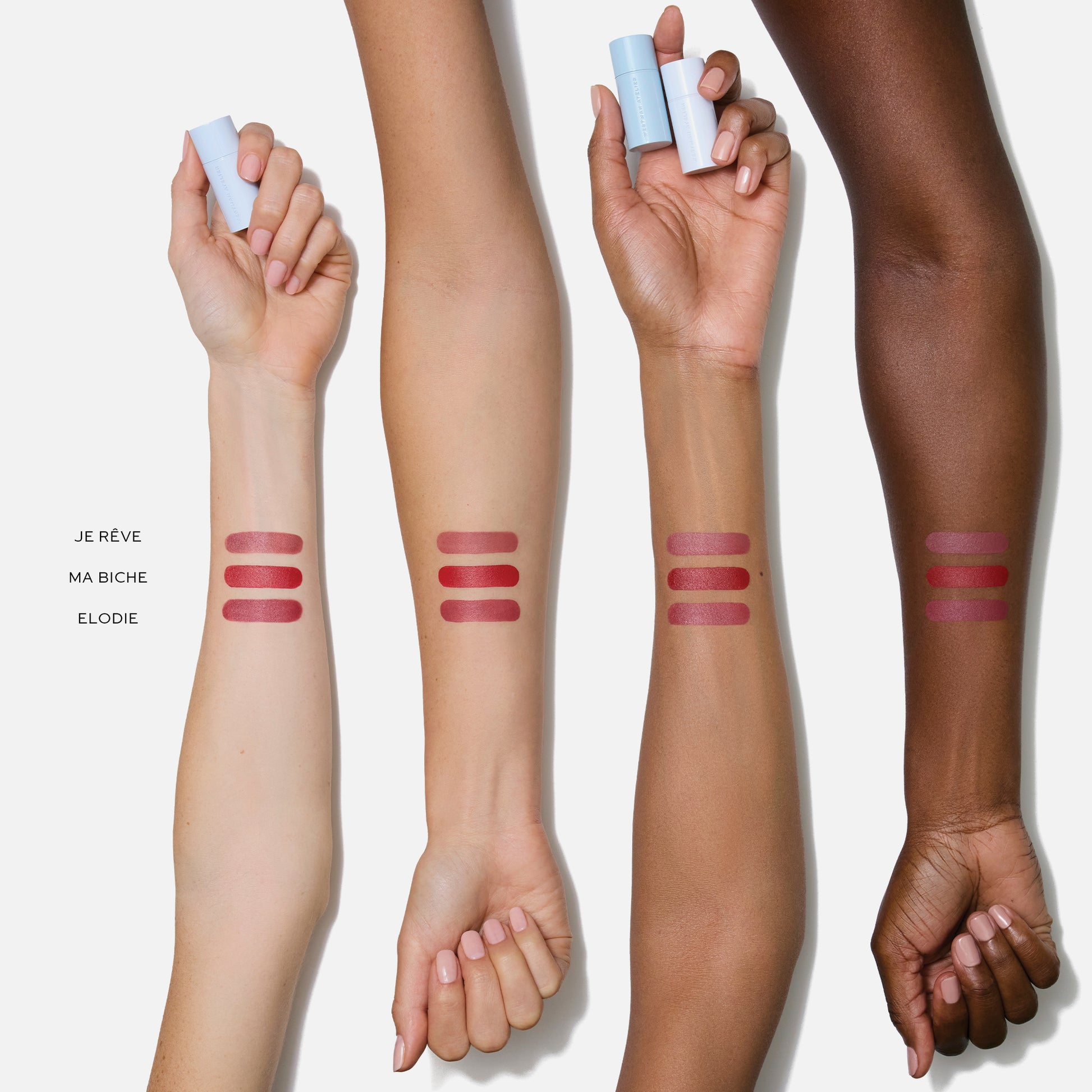 Westman Atelier luxury matte lipstick gift set swatches on diverse arms showcasing various shades