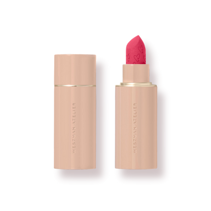Westman Atelier Luxury Matte Lipstick in vibrant pink shade with elegant packaging