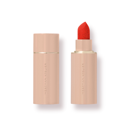 Westman Atelier Luxury Matte Lipstick in bold red shade with sleek packaging for a high-end look