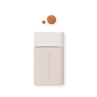 Westman Atelier Radiant Skin Tint in a sleek bottle with two swatches of the tint above