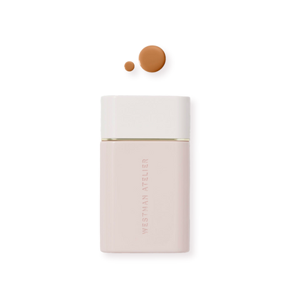 Westman Atelier Radiant Skin Tint bottle with swatches of foundation in two shades