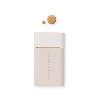 Westman Atelier Radiant Skin Tint in elegant bottle with two swatches of product for a flawless look