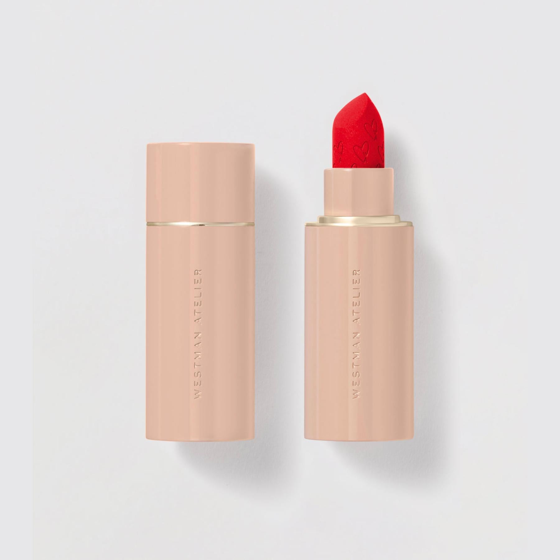 Westman Atelier Comfortable Matte Lipstick in vibrant red with sleek packaging for a bold look