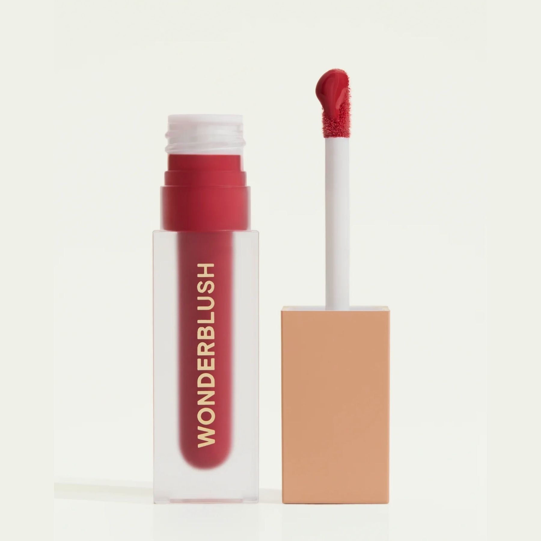 Wonderblush Tinted Lip Oil in Red with a Doe-foot Applicator for Smooth Application
